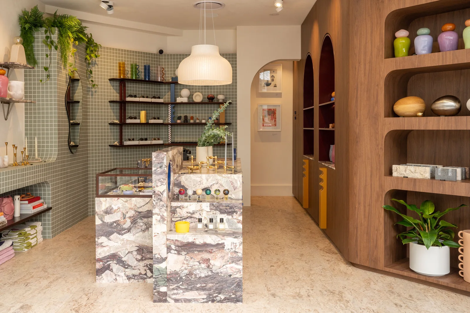 Retail fitout with walnut arched display cabinets