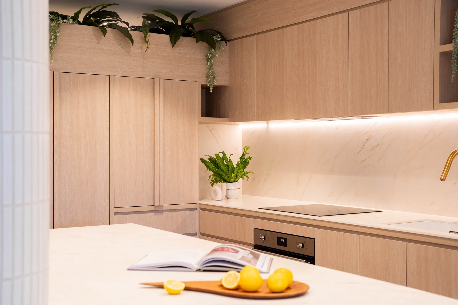 Light oak kitchen with stone island