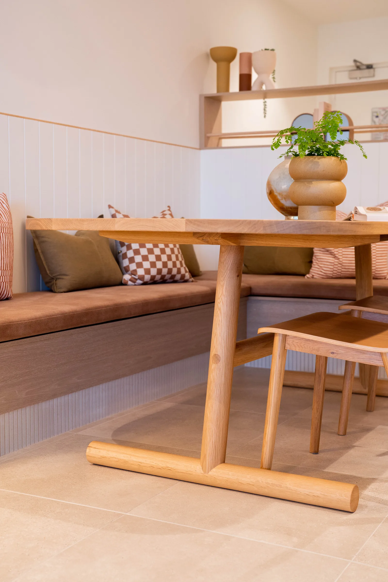 Built-in oak banquette dining seating